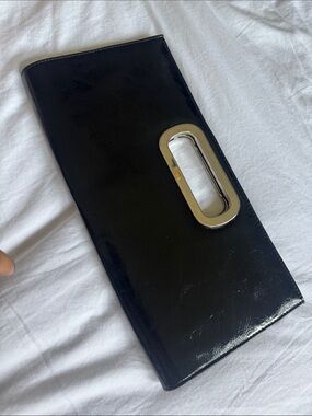 Sleek Black faux Leather Clutch with Silver Cutout Handle